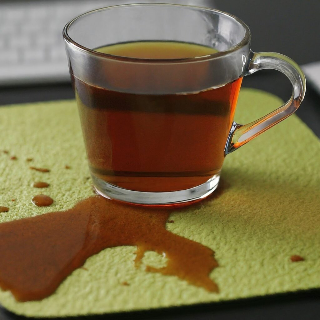 Spilled tea on mouse pad